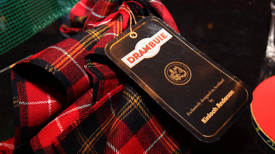 The Drambuie Tartan was based on the MacKinnon Hunting tartan as MacKinnon's are the owners of Drambuie.